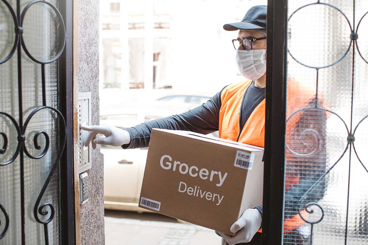 Delivery person delivering package