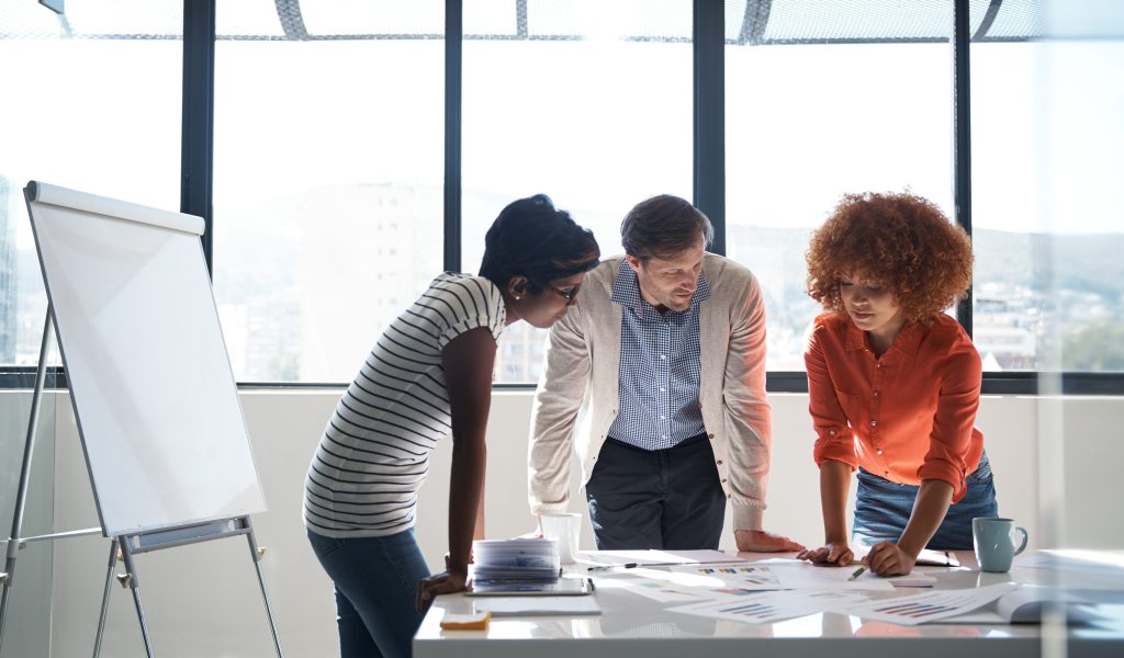 Shot of a group of colleagues having a brainstorming session in the boardroom