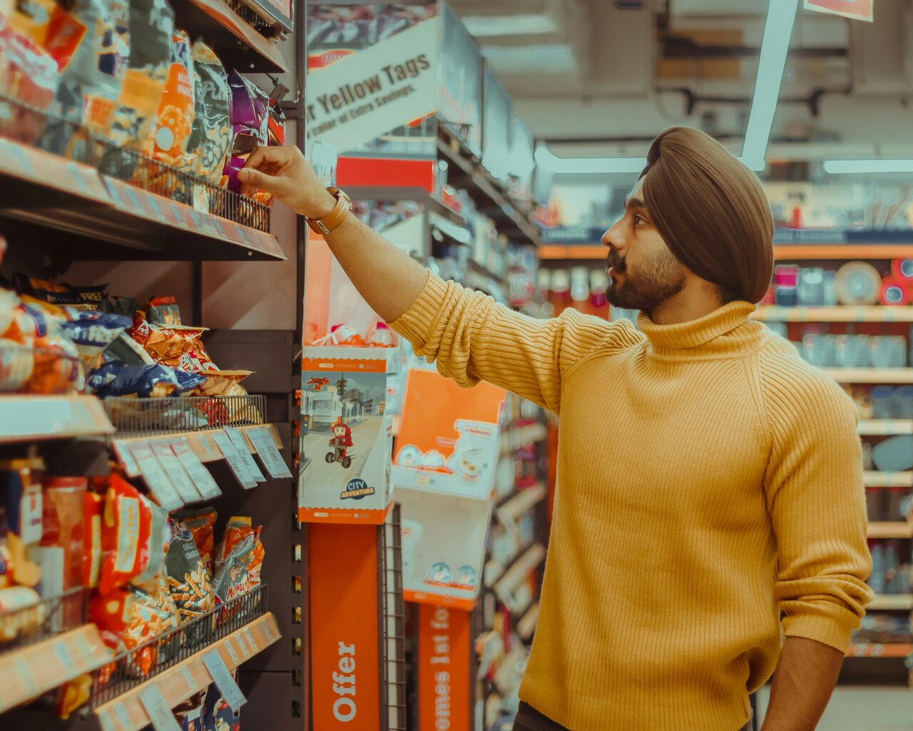 Sikh man shops for snacks