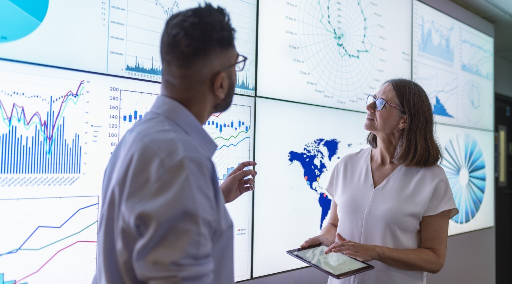 Woman and men talking about data