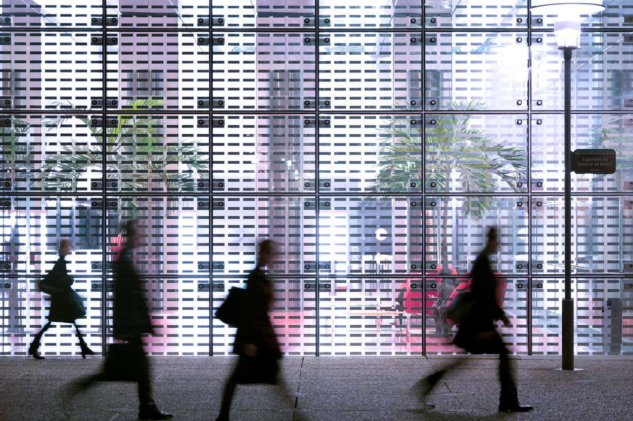 business people walking in a city street