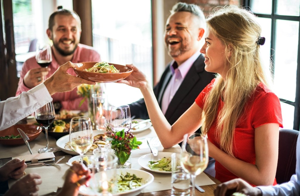 People enjoying a meal in a restaurant