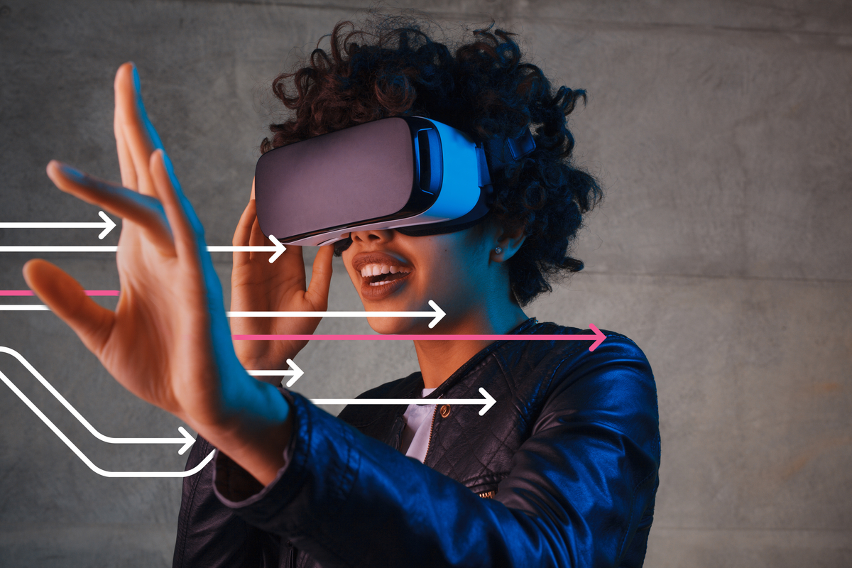 Amazed young woman touching the air during the VR experience. Horizontal studio shot.