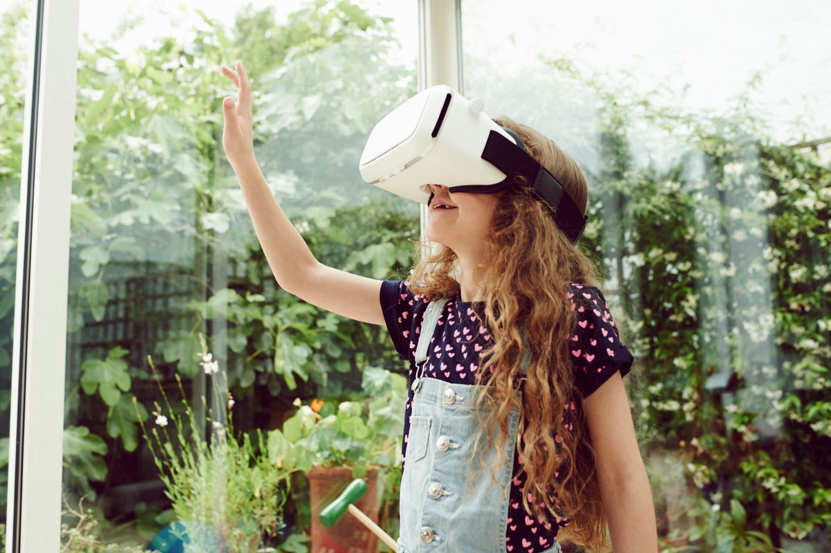 Portrait of child wearing  virtual reality headset