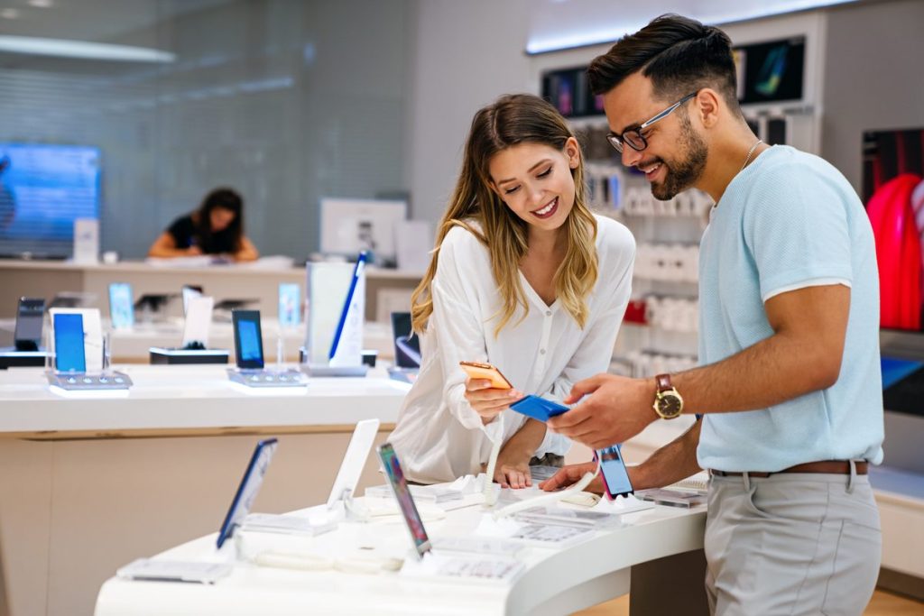 people in a smartphone store