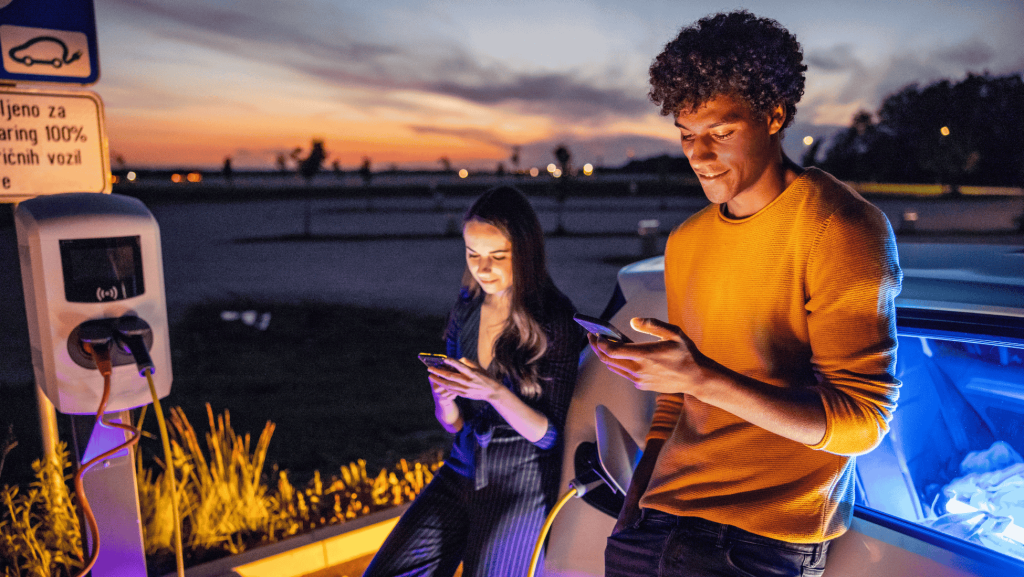 two young persons with smartphones