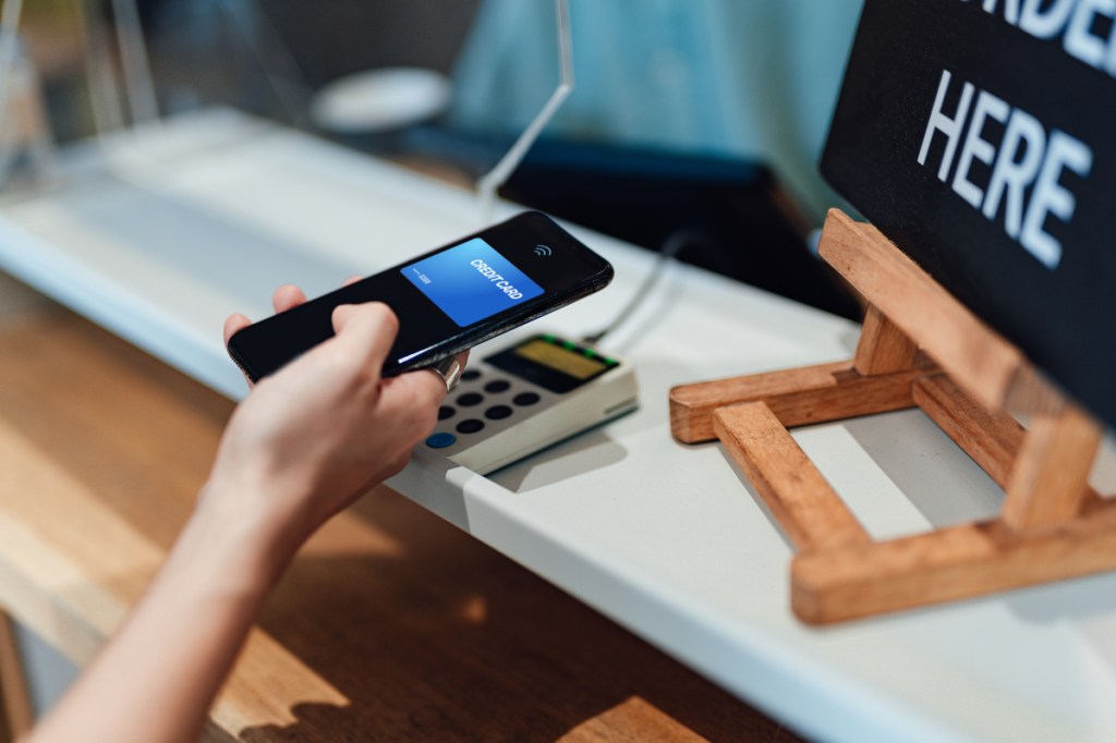 man paying with his cellphone