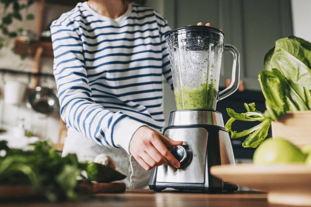 women making a green drink