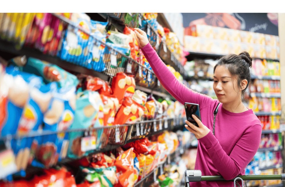 women in a snack shelf