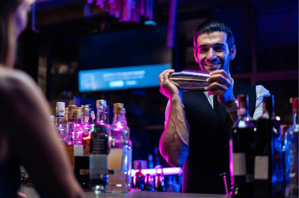 barman serving a drink