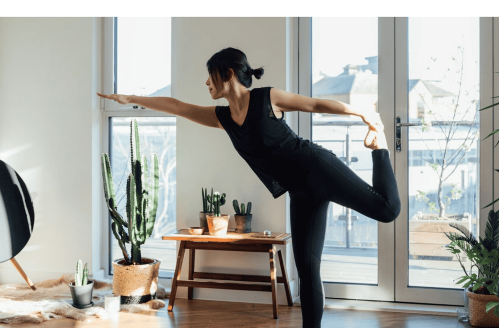 women practicing yoga