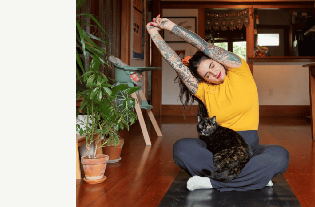 women and her cat together
