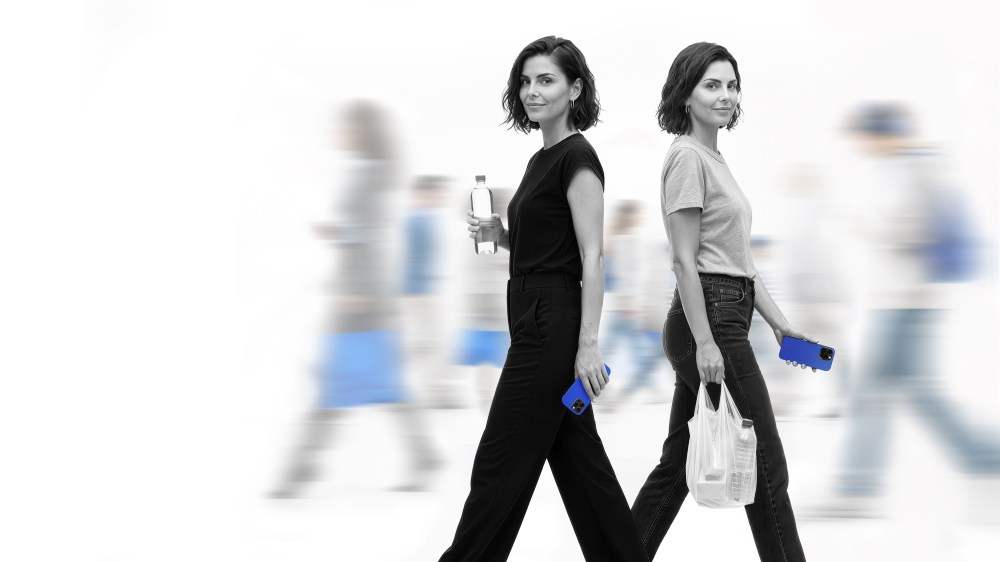 Conceptual image of consumer polarization, showing the same shopper balancing premium purchases and value-driven choices