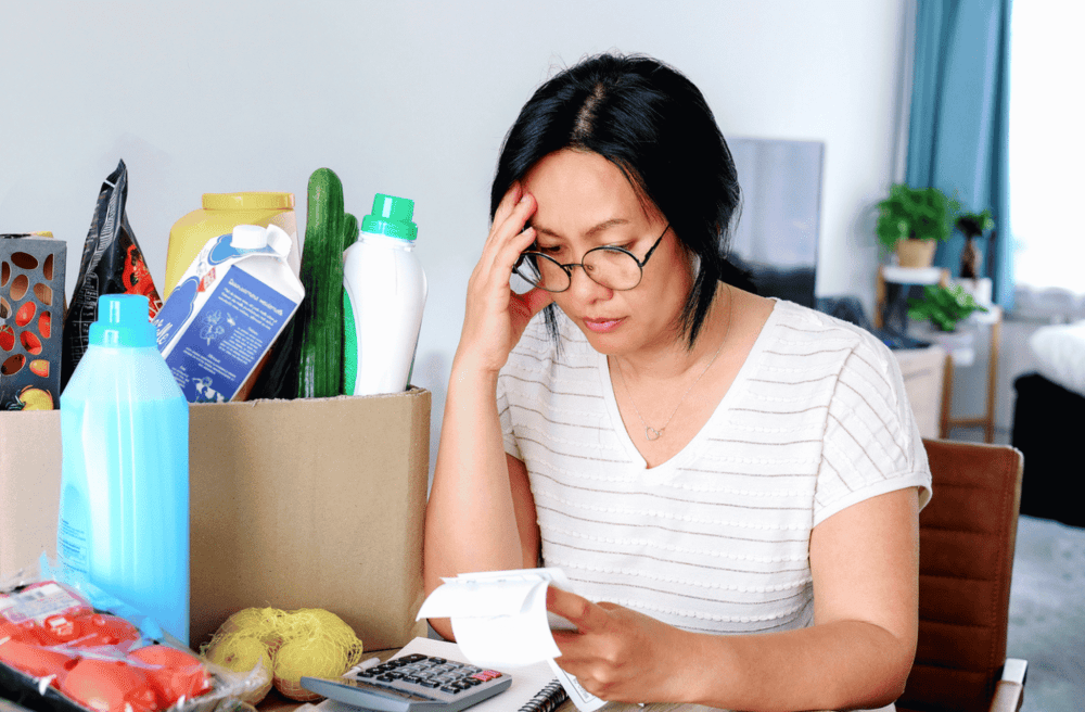 women looking at the price of food