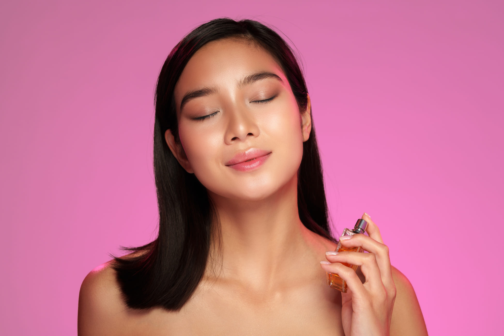 women using perfume