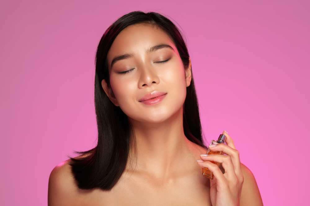 women using perfume