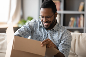 Man looking at packages