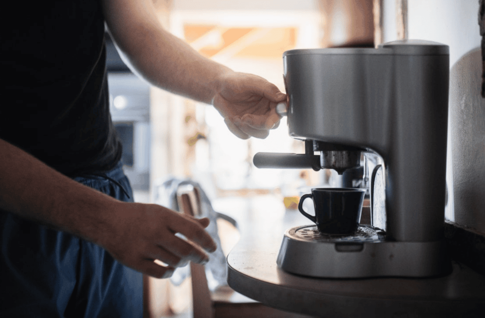 man making coffee
