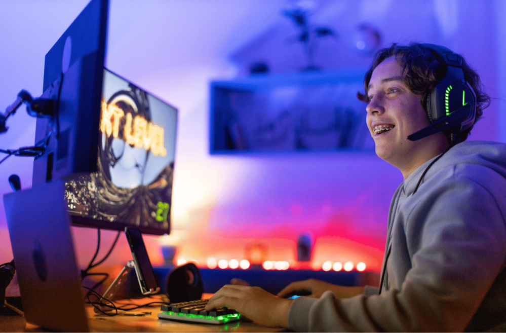 kid with a gaming computer