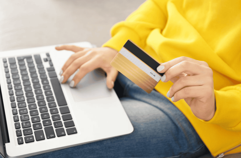 person paying with credit card