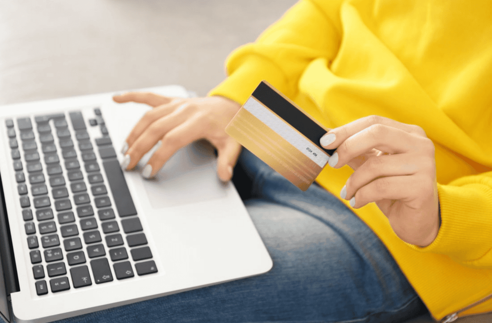 person paying with credit card
