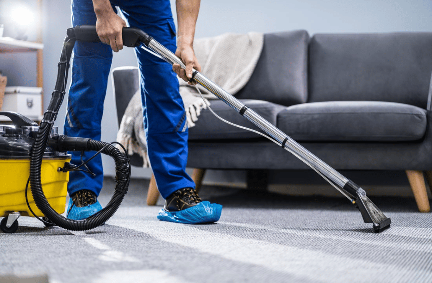 person using a cleaning machine